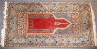 Lot 519 - A Persian prayer rug