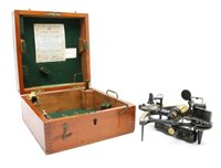 Lot 180 - A brass and metal sextant by Henry Hughes and Son