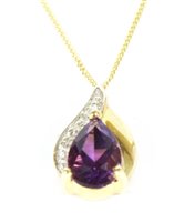 Lot 39 - A gold pear shaped amethyst and diamond pendant