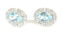 Lot 37 - A pair of gold topaz and diamond cluster stud earrings