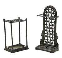 Lot 527 - Two cast iron stick stands