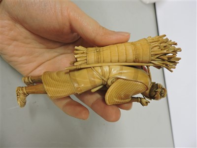 Lot 361 - A Japanese ivory okimono