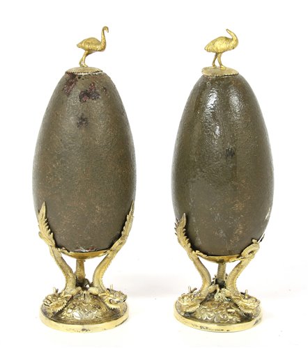 Lot 207 - An unusual pair of decorative Chinese silver gilt mounted 'eggs'