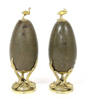 Lot 207 - An unusual pair of decorative Chinese silver gilt mounted 'eggs'