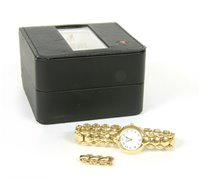 Lot 286 - A ladies gold plated Raymond Weil quartz bracelet watch