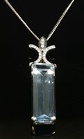 Lot 445 - An 18ct white gold aquamarine and diamond pendant