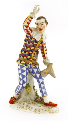 Lot 245 - A Meissen figure of an harlequin dancing