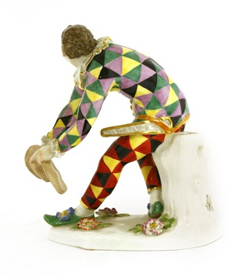 Lot 242 - A Meissen figure of a bowing harlequin