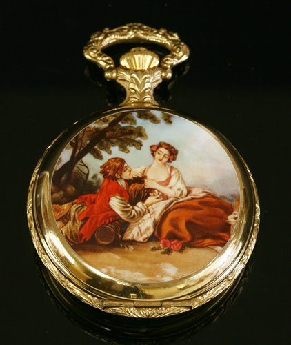 Lot 591 - A cased Reuge Musical gold plated full hunter pocket watch