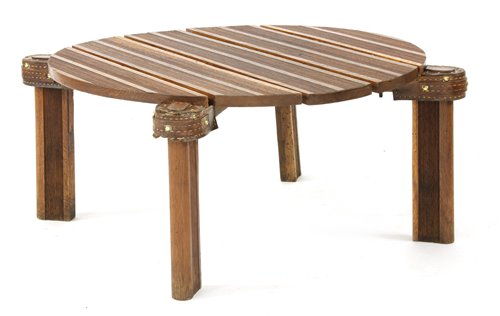 Lot 330 - An oak circular coffee table