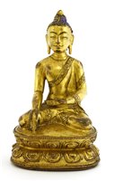 Lot 189 - A Tibetan gilt bronze Shakyamuni