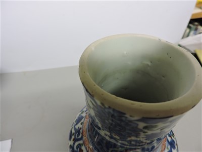 Lot 33 - A Chinese wucai gu vase