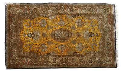 Lot 639 - A Persian silk rug