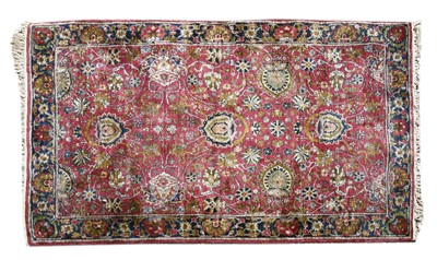 Lot 817 - A Persian silk and woollen rug