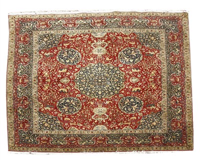 Lot 543 - A Persian design woollen carpet