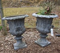 Lot 1061 - A pair of garden urns