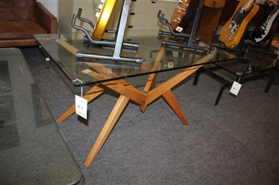 Lot 342 - An Italian beechwood and glass coffee table