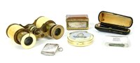 Lot 127 - A silver vesta, matchbox holder, a 9ct gold rimmed cheroot holder in case, a compact, a snuff box and opera glasses
