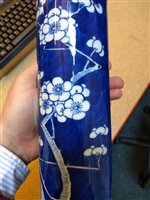 Lot 419 - A Chinese blue and white prunus pattern, cylindrical vase and a similar jar and cover