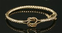 Lot 643 - An Edwardian knot bangle