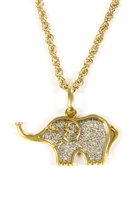 Lot 20 - A two colour gold diamond set elephant pendant