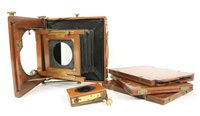 Lot 479 - A mahogany brass plate camera