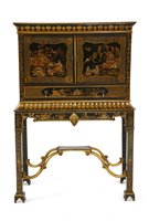 Lot 576 - A chinese Chippendale style black lacquered chinoisserie cabinet on stand