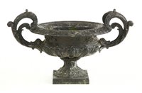 Lot 609 - A cast iron and black painted urn