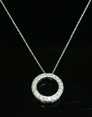 Lot 453 - An 18ct white gold diamond set hoop slide pendant