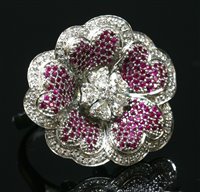 Lot 298 - A white gold diamond and ruby flower head cocktail ring