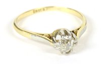 Lot 204 - A gold single stone cushion cut diamond ring