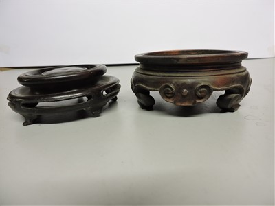 Lot 442 - A collection of Chinese wood stands