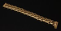Lot 244 - A 9ct gold oval link bracelet