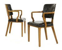 Lot 186 - A pair of Art Deco walnut elbow chairs