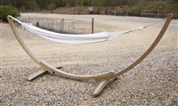 Lot 1108 - An Amazonas hammock on bow shaped stand, approx 370cm long