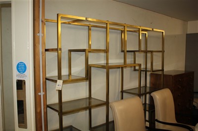 Lot 363 - A modern brass wall shelf