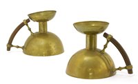 Lot 34 - A pair of 'Kardofan' brass chambersticks