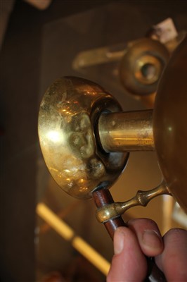 Lot 34 - A pair of 'Kardofan' brass chambersticks