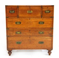 Lot 691 - A teak and brass bound campaign secretaire chest