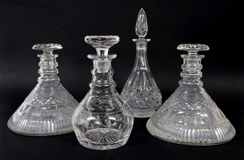 Lot 403 - A pair of cut glass ships' decanters, and two others