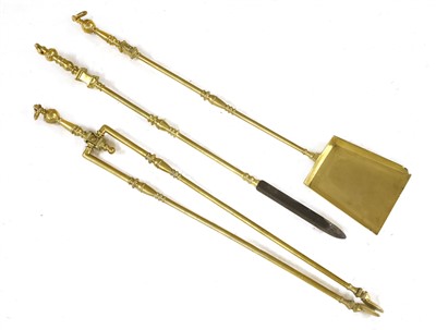 Lot 726 - A set of three brass fire irons