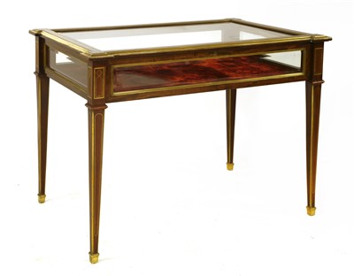 Lot 561 - An Empire-style rosewood and brass inlaid bijouterie table