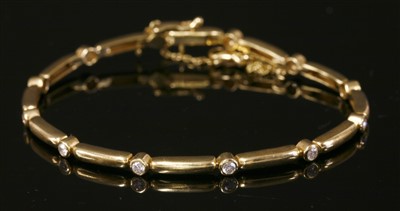 Lot 390 - An 18ct gold diamond bracelet by Eric Smith, c.2009