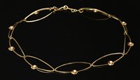 Lot 166 - An 18ct gold and cultured pearl necklace by Christopher Wharton, c.2000