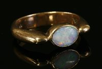 Lot 667A - A 9ct gold single stone opal ring, by Christopher Wharton