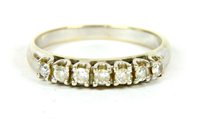 Lot 231 - A white gold seven stone diamond ring