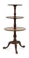 Lot 813 - A George III and later mahogany three tier dumb waiter