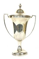 Lot 178 - A silver trophy and cover