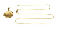 Lot 253 - An Italian 9ct gold circular hinge locket
