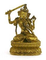 Lot 191 - A Chinese gilt bronze bodhisattva